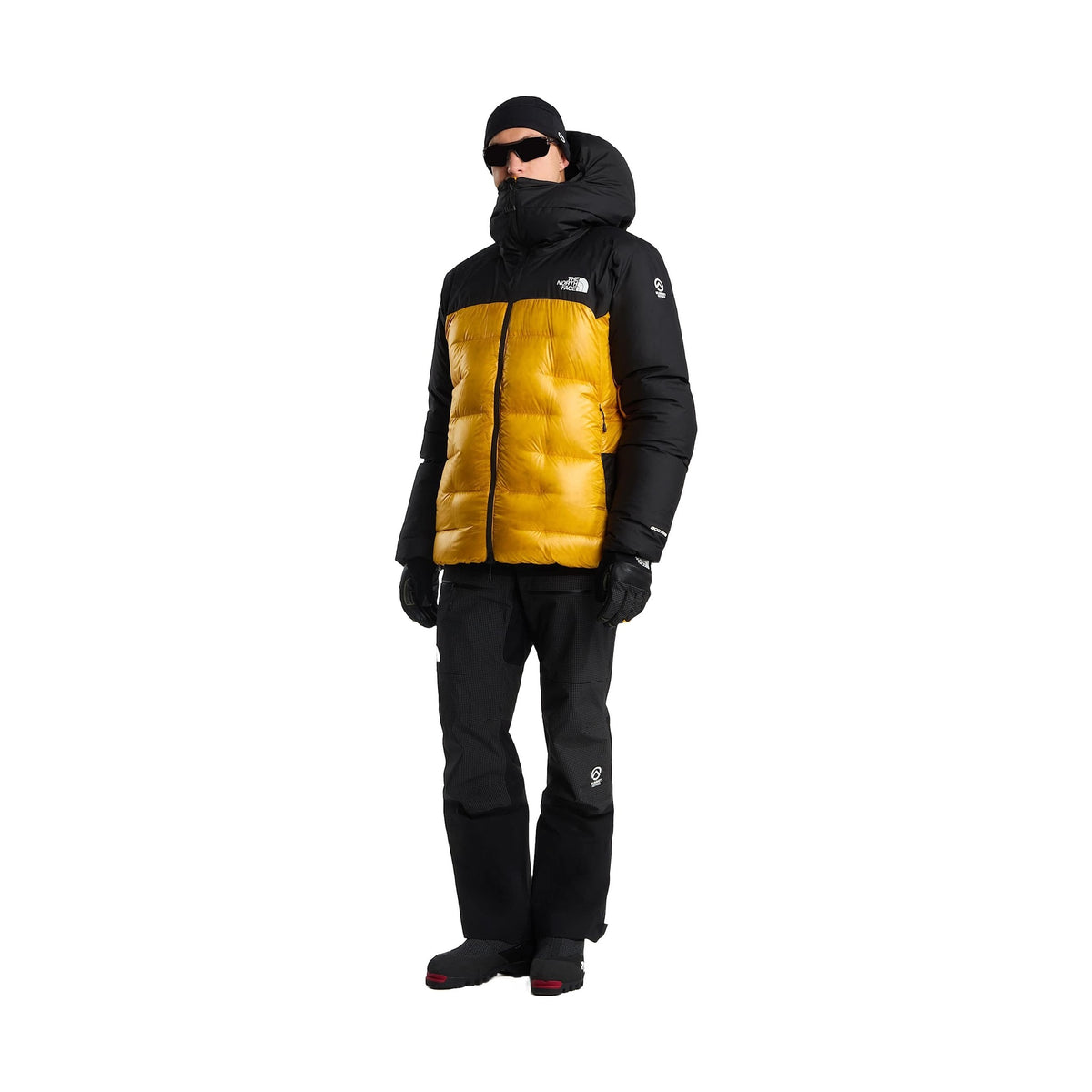 The North Face Summit Himalayan Down Parka i svart och guld med stor huva