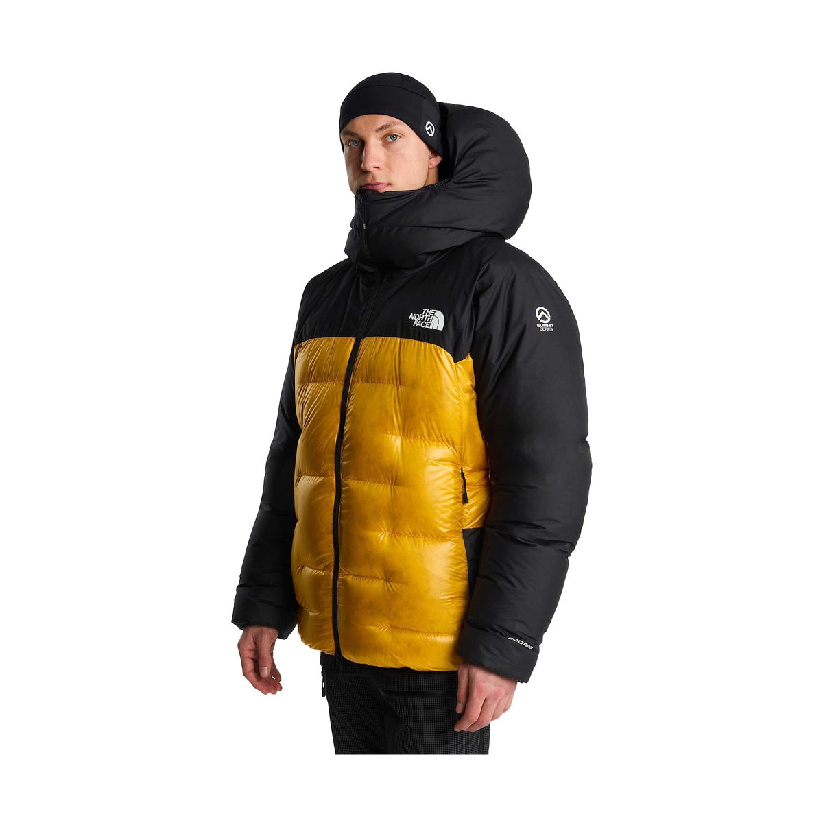 Framsida av gul och svart dunparka med huva och Summit Series-symbol